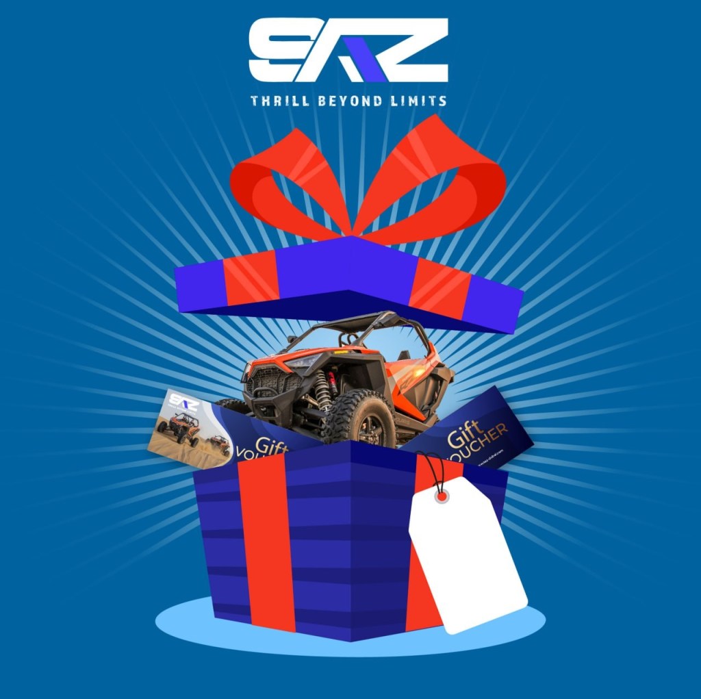 Gift box with an off-road vehicle image and gift vouchers emerging.